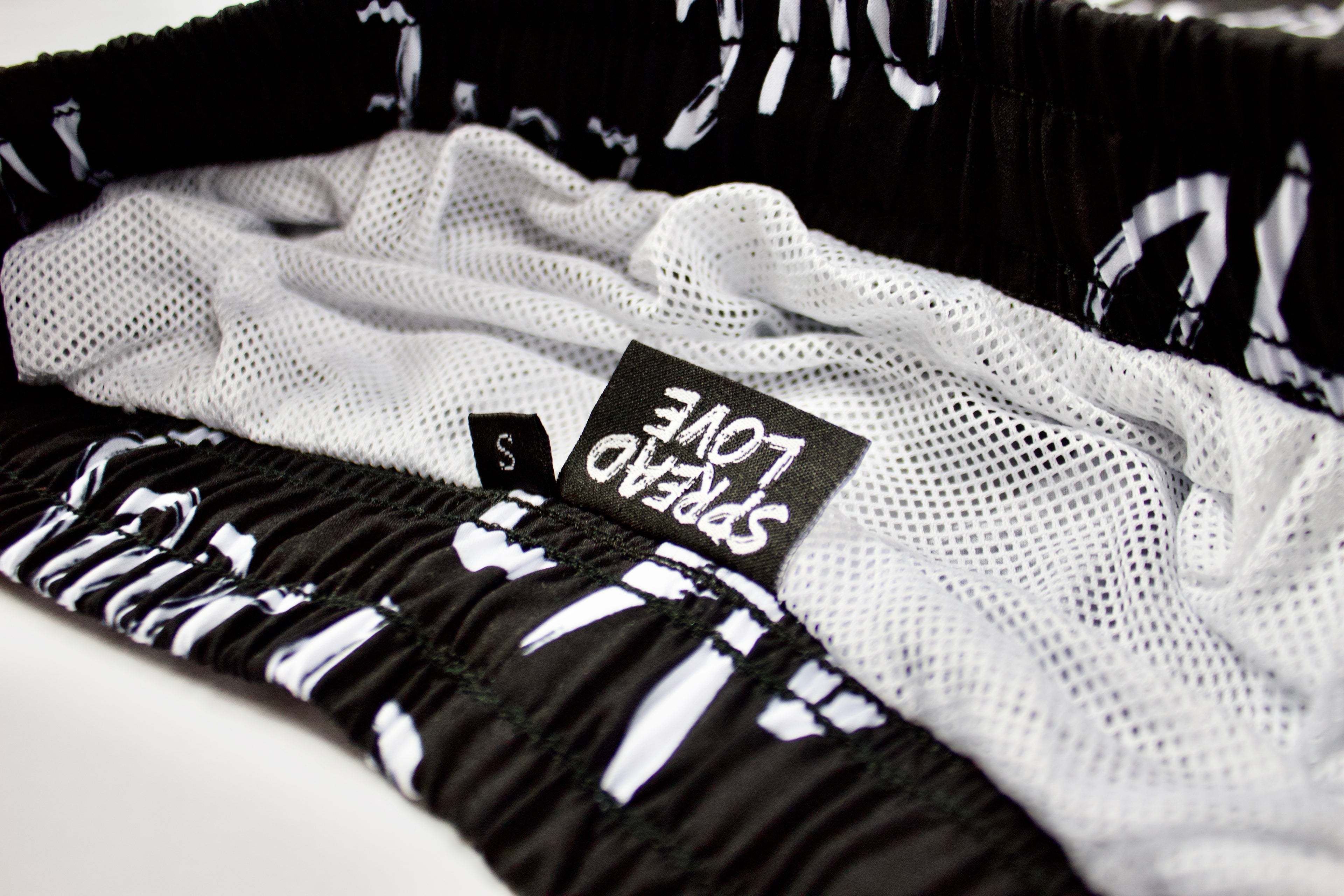 Spread Love - Unisex Swim Shorts
