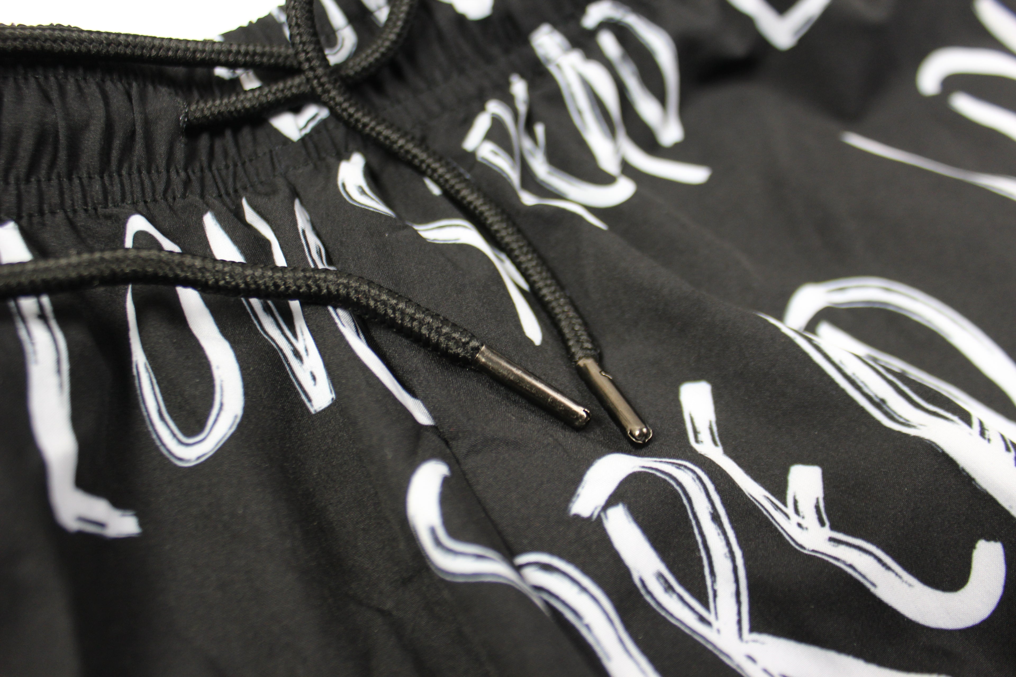 Spread Love - Unisex Swim Shorts